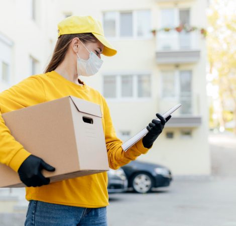 medium-shot-delivery-woman-holding-box